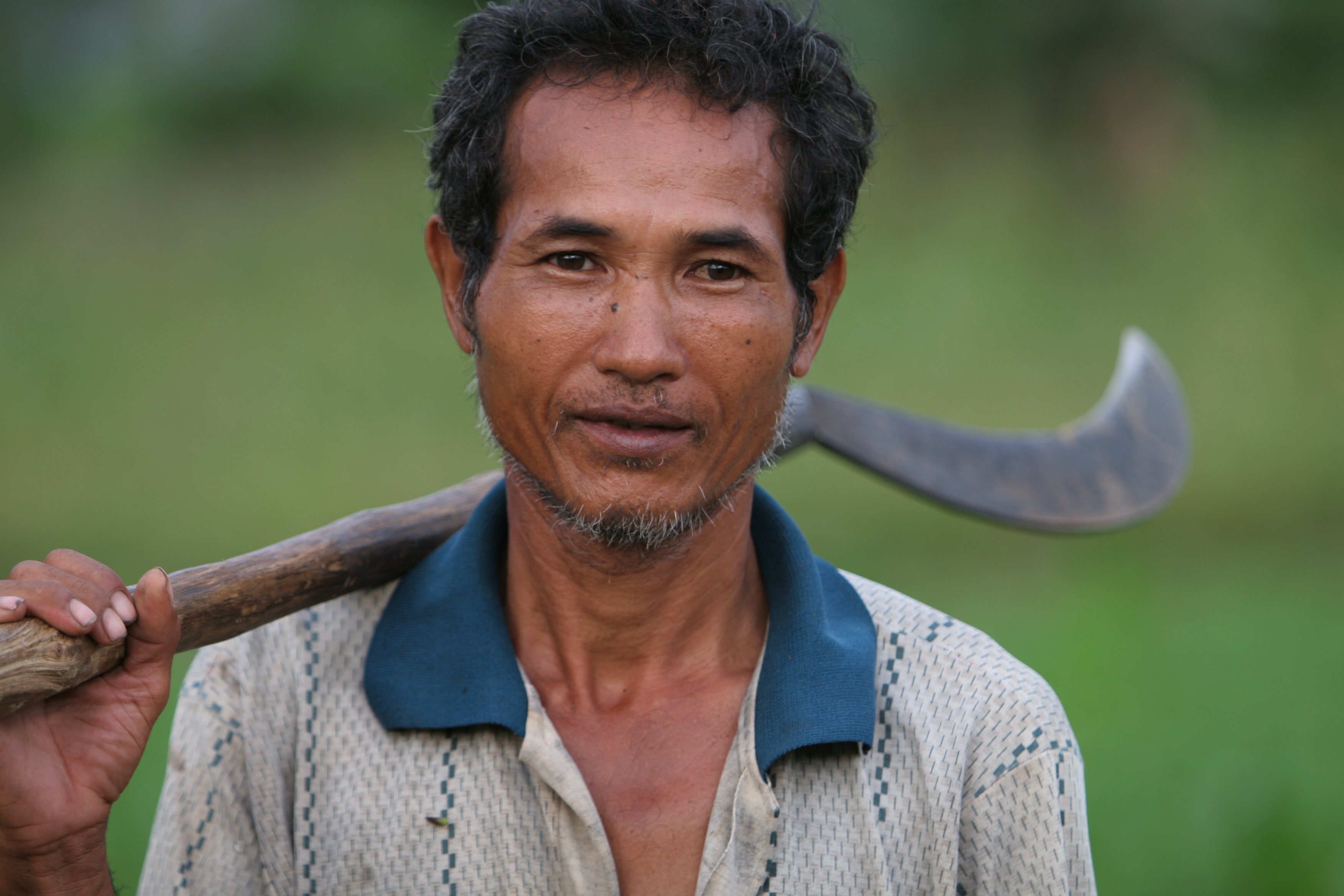 Man with Sithe in Cambodia