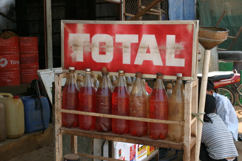 Gas Station in Cambodia — Bottles of gas for sale at a street stand in Cambodia, for moterscooters — Cambodia, gas, gasoline, bottles