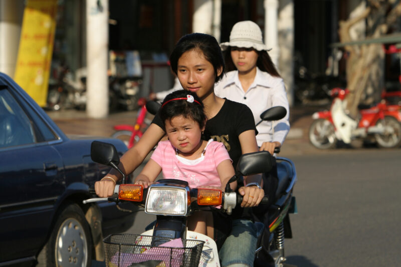 Daily Commute by Moterbike — People travel to work on motorbike in Phnom Penh, Cambodia — Cambodia, street, streets, traffic, motorcycle