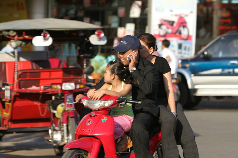 Daily Commute by Moterbike — People travel to work on motorbike in Phnom Penh, Cambodia — Cambodia, street, streets, traffic, motorcycle