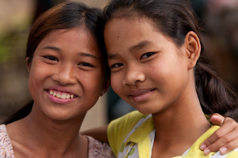 Friends in Cambodia — Faces of young girls growing up in poverty in rural Cambodia: Friends — Cambodia, faces, child, children, poor