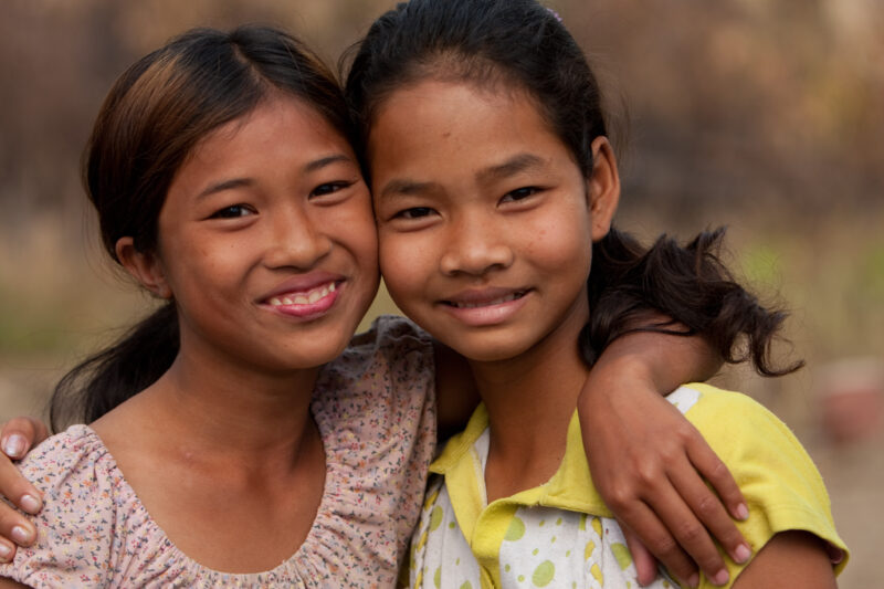 Friends in Cambodia — Faces of young girls growing up in poverty in rural Cambodia: Friends — Cambodia, faces, child, children, poor