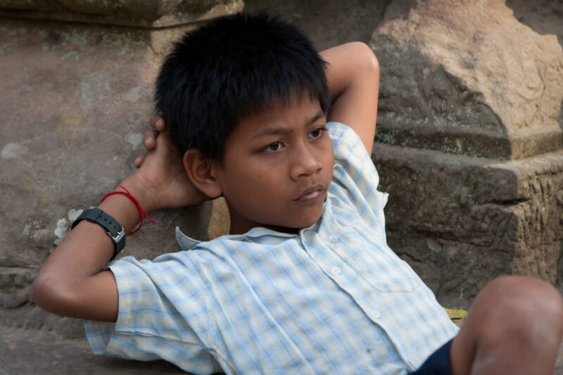 Angkor Wat in Cambodia — Stock image of the temple ruins of Angkor Wat complex near Siem Reap, Cambodia — Cambodia, Angkor Wat, Siem Reap, boy, child