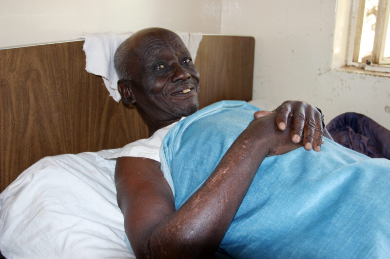 HIV/AIDS Patient in Hospital in Africa — People in hospital with opportunistic illnesses due to their HIV infections. — Kenya, Africa, HIV, AIDS, Hospital