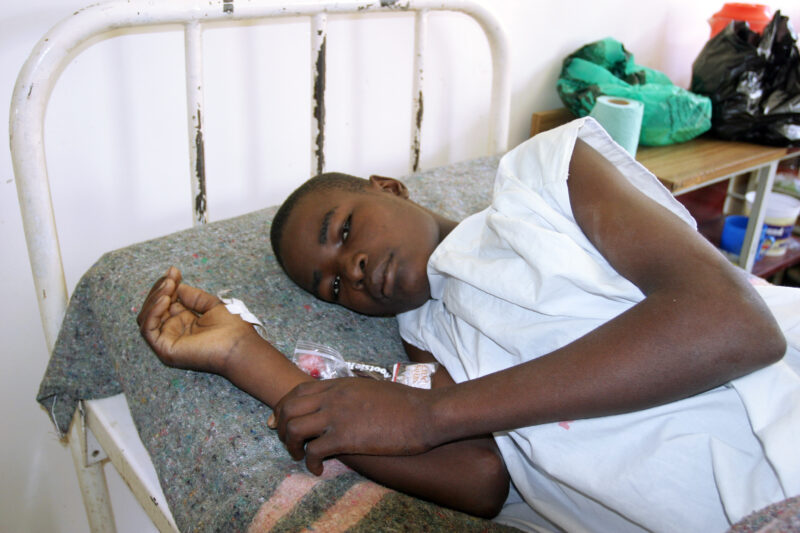 HIV/AIDS Patient in Hospital in Africa — People in hospital with opportunistic illnesses due to their HIV infections. — Kenya, Africa, HIV, AIDS, Hospital