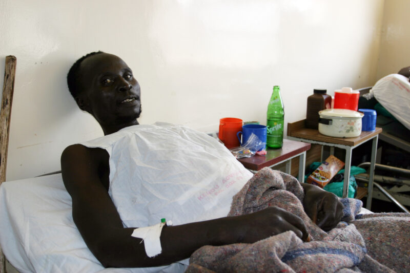 HIV/AIDS Patient in Hospital in Africa — People in hospital with opportunistic illnesses due to their HIV infections. — Kenya, Africa, HIV, AIDS, Hospital