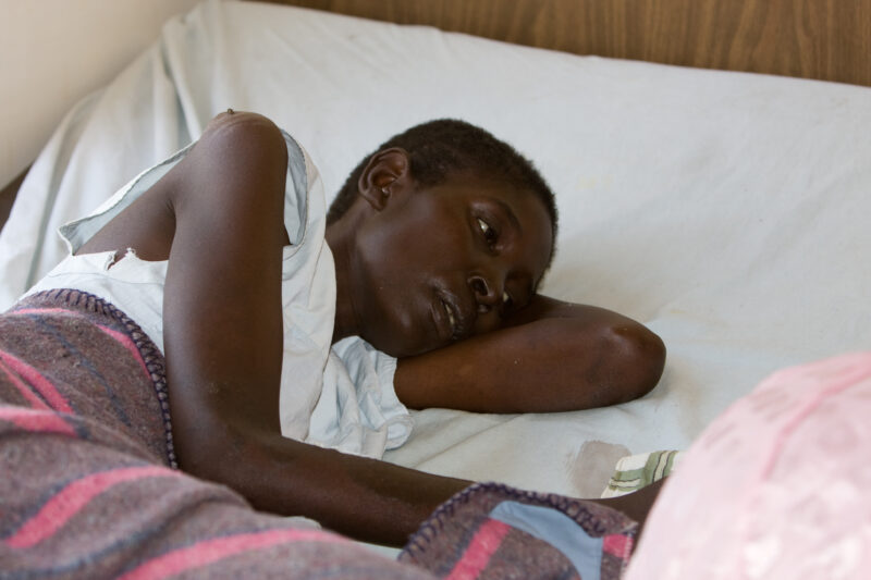 HIV/AIDS Patient in Hospital in Africa — People in hospital with opportunistic illnesses due to their HIV infections. — Kenya, Africa, HIV, AIDS, Hospital