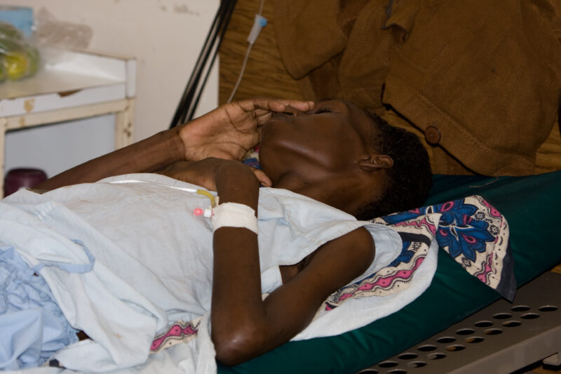HIV/AIDS Patient in Hospital in Africa — People in hospital with opportunistic illnesses due to their HIV infections. — Kenya, Africa, HIV, AIDS, Hospital