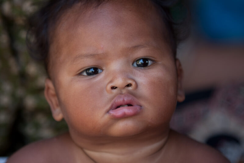 Baby in Cambodia — Stock Images of people living in a floating village on Tonle Sap Lake, Cambodia — Cambodia, poverty, babies, baby, child