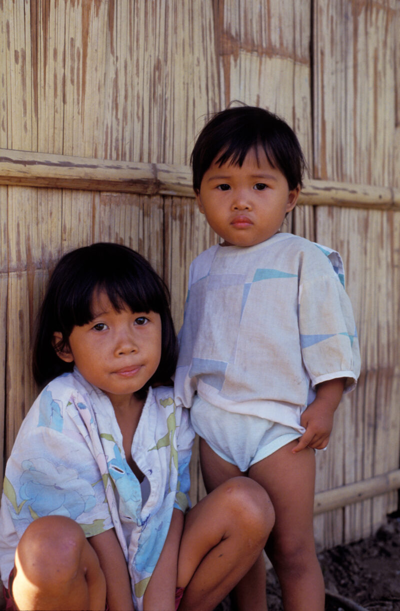Children in the Philippines — Children by the wall of their Bamboo house in the Philippines — Babies, Children, faces, Philippines