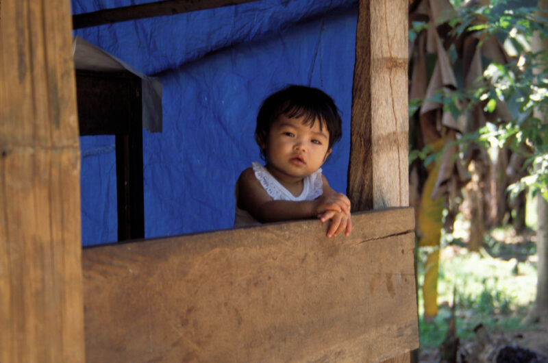 Baby in the Philippines — Baby looks out of the window in the Philippines — Babies, Children, faces, Philippines