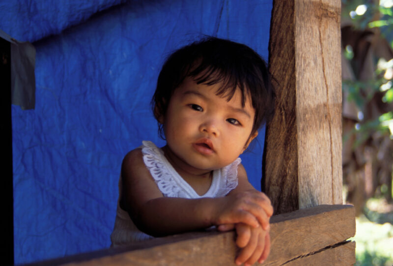Baby in the Philippines — Baby looks out of the window in the Philippines — Babies, Children, faces, Philippines