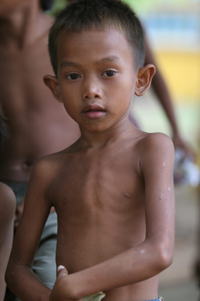 Boy In Cambodia — Stock image of young boy living in poverty in Rural Cambodia — Cambodia, Boy, boys, poverty, child