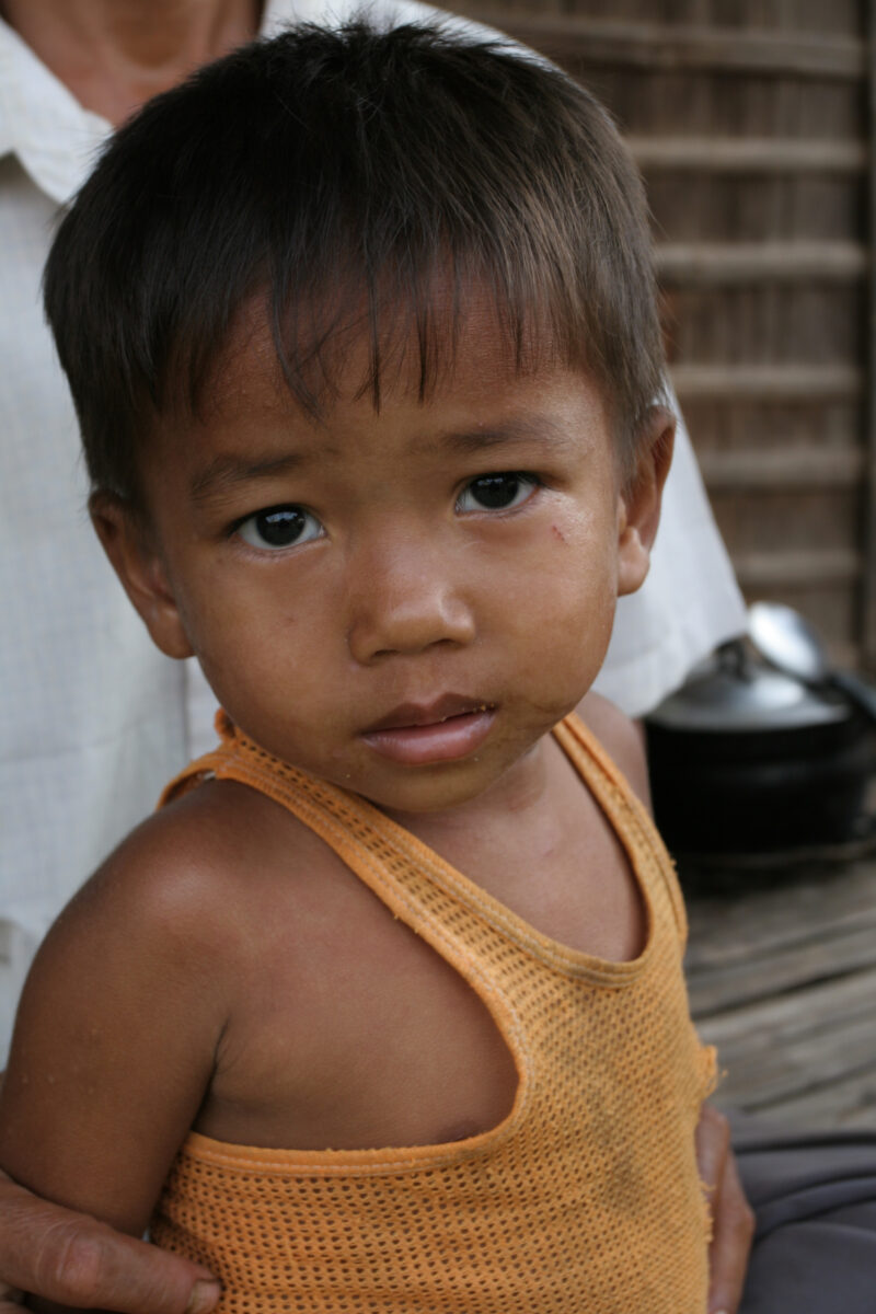 Boy In Cambodia — Stock image of young boy living in poverty in Rural Cambodia — Cambodia, Boy, boys, poverty, child