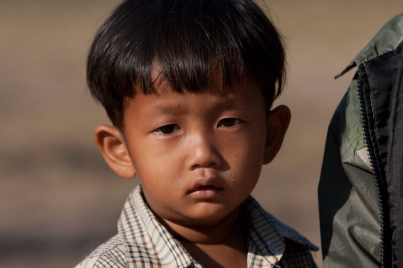 Boy In Cambodia — Stock image of young boy living in poverty in Rural Cambodia — Cambodia, Boy, boys, poverty, child