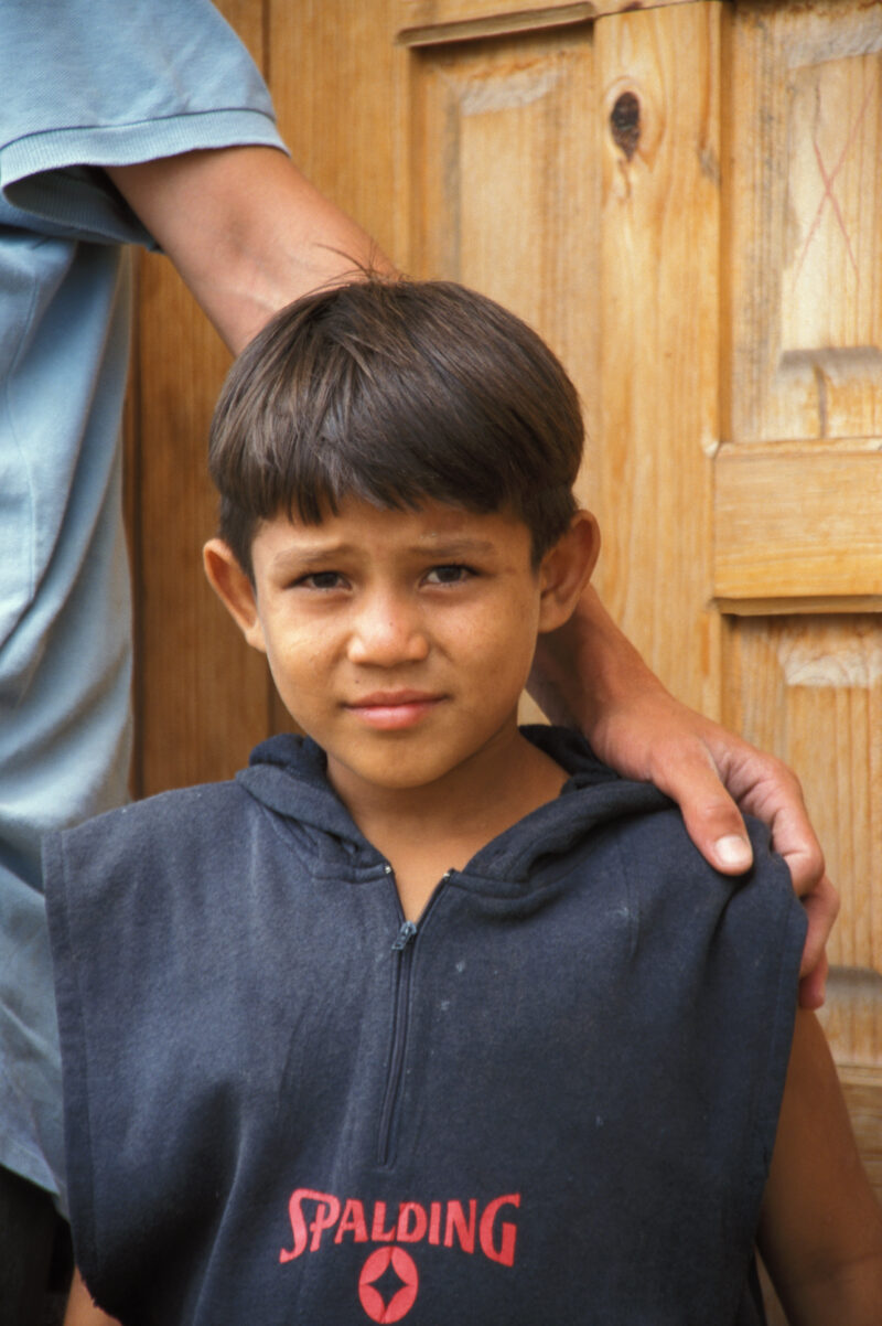 Boy in Honduras — Boy living in an IDP camp after being displaced by flooding and mudslides. — Honduras, boys, boy, IDP, refugee