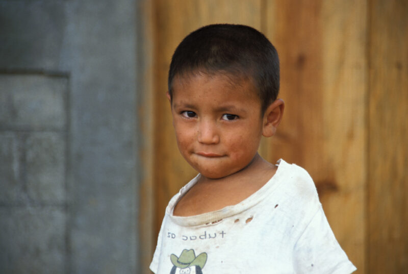 Boy in Honduras — Boy living in an IDP camp after being displaced by flooding and mudslides. — Honduras, boys, boy, IDP, refugee