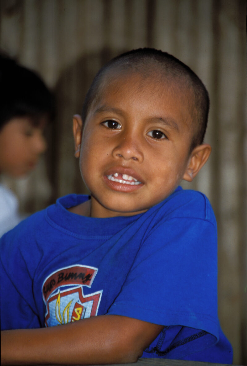 Boy in Honduras — Boy living in an IDP camp after being displaced by flooding and mudslides. — Honduras, boys, boy, IDP, refugee