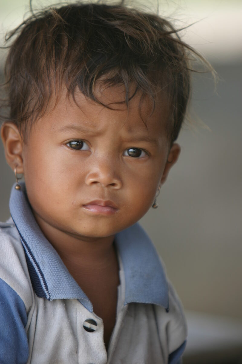 Boy In Cambodia — Stock image of young boy living in poverty in Rural Cambodia — Cambodia, Boy, boys, poverty, child