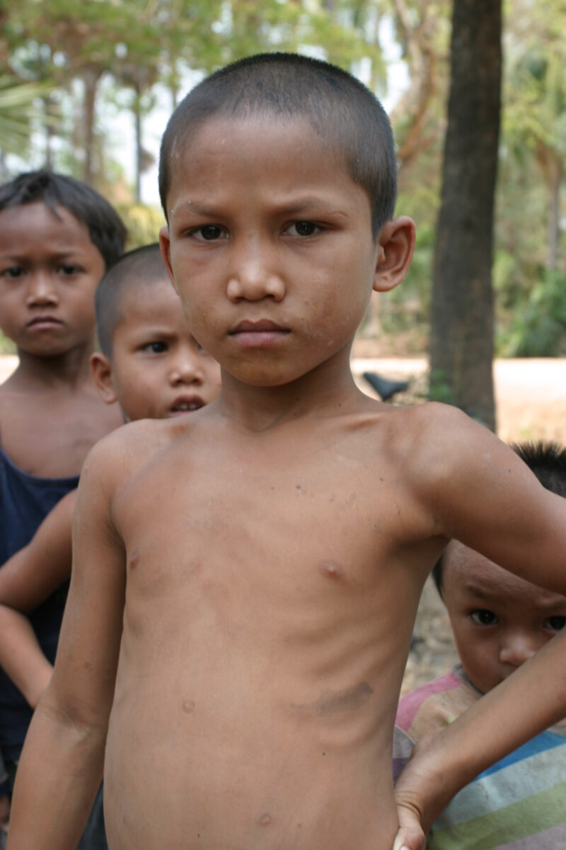Boy In Cambodia — Stock image of young boy living in poverty in Rural Cambodia — Cambodia, Boy, boys, poverty, child