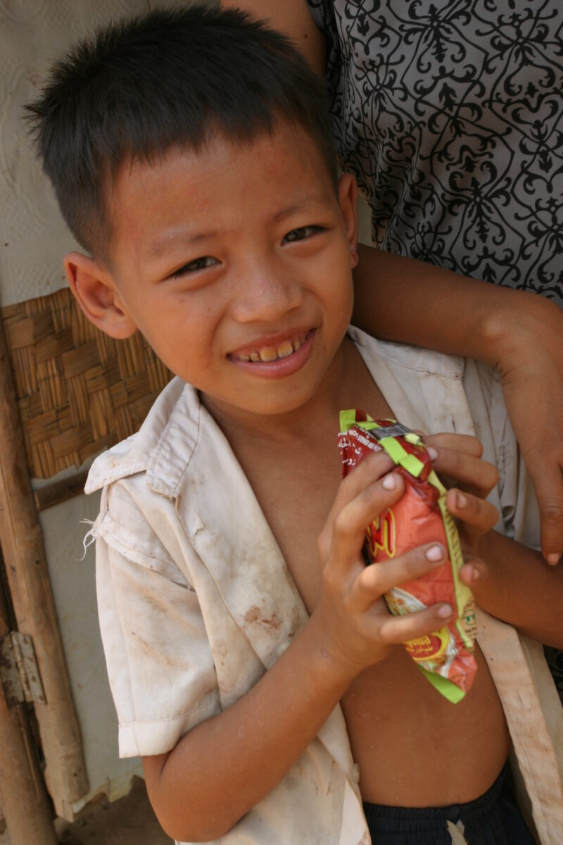 Boy In Cambodia — Stock image of young boy living in poverty in Rural Cambodia — Cambodia, Boy, boys, poverty, child