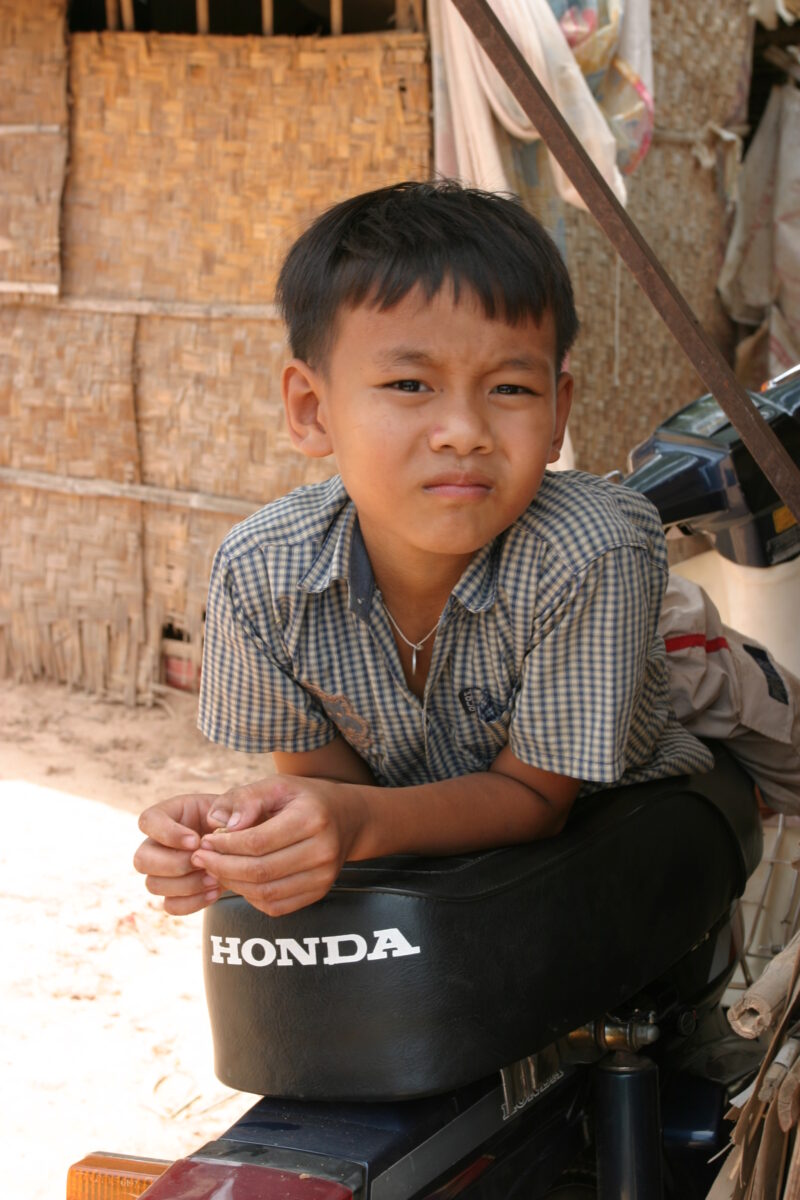 Boy In Cambodia — Stock image of young boy living in poverty in Rural Cambodia — Cambodia, Boy, boys, poverty, child