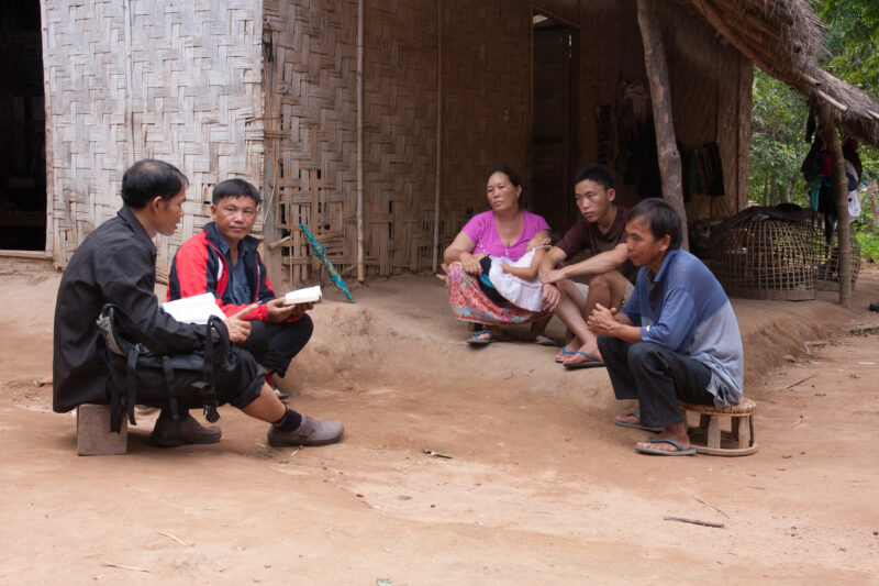 Bible Study in Laos — Ethnic Minority people study the Bible with a Adventist Pastor visiting their village in Laos — Laos, Southeast Asia, Bible Study, Chri...
