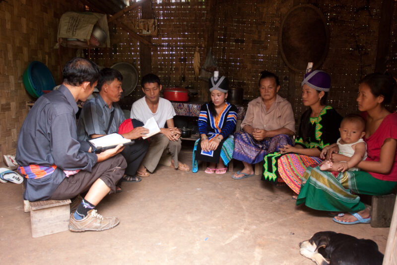 Bible Study in Laos — Ethnic Minority people study the Bible with a Adventist Pastor visiting their village in Laos — Laos, Southeast Asia, Bible Study, Chri...