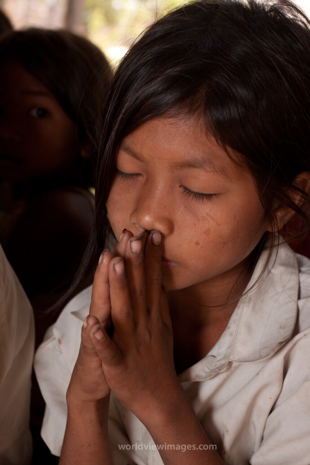 Praying in Cambodia