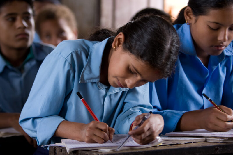 Girl in School in Nepal — Children attend school in rural Nepal, thanks to a sponsorship program run by ADRA — Nepal, students, children, elementary, school