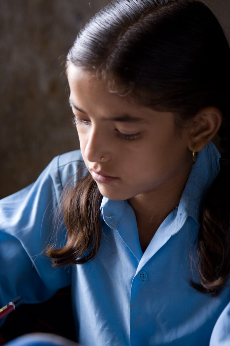 Girl in School in Nepal — Children attend school in rural Nepal, thanks to a sponsorship program run by ADRA — Nepal, students, children, elementary, school