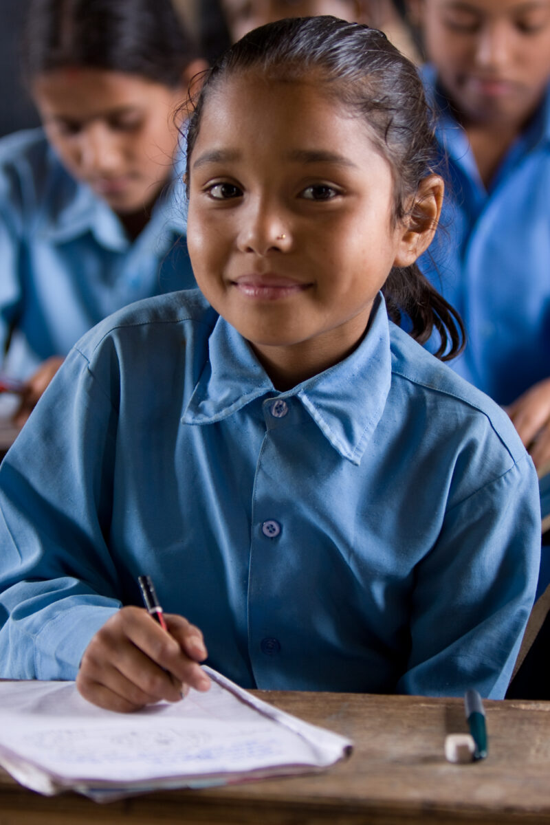 Girl in School in Nepal — Children attend school in rural Nepal, thanks to a sponsorship program run by ADRA — Nepal, students, children, elementary, school