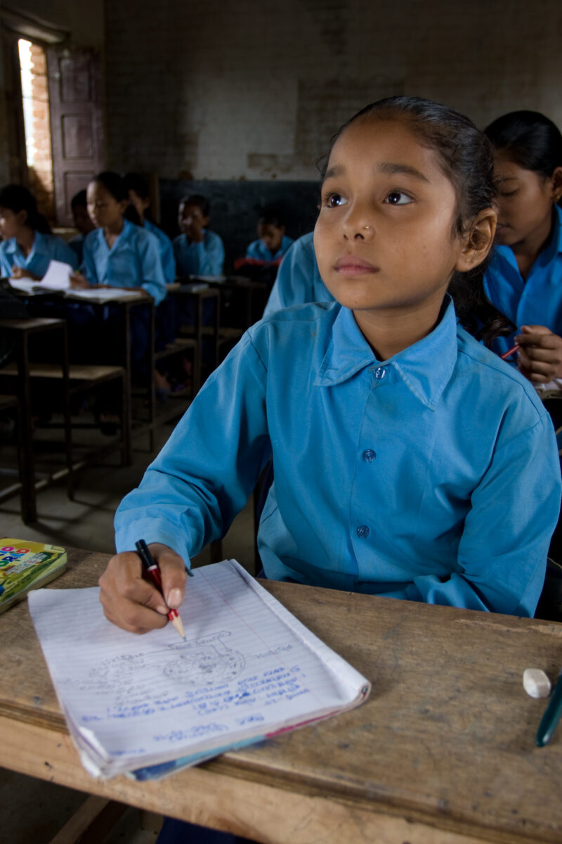 Girl in School in Nepal — Children attend school in rural Nepal, thanks to a sponsorship program run by ADRA — Nepal, students, children, elementary, school