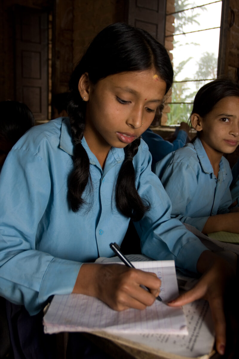 Girl in School in Nepal — Children attend school in rural Nepal, thanks to a sponsorship program run by ADRA — Nepal, students, children, elementary, school