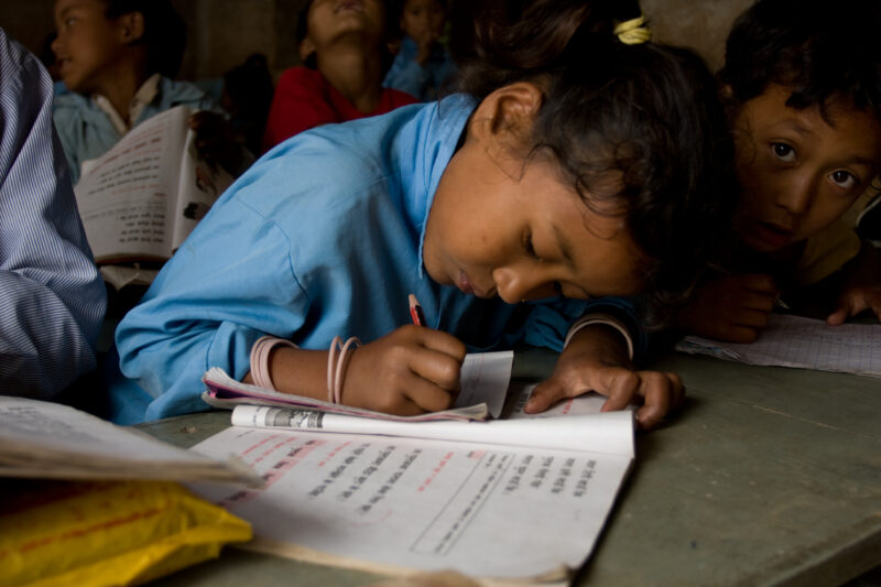 Student in Nepal School — Children attend school in rural Nepal, thanks to a sponsorship program run by ADRA — Nepal, students, children, elementary, school