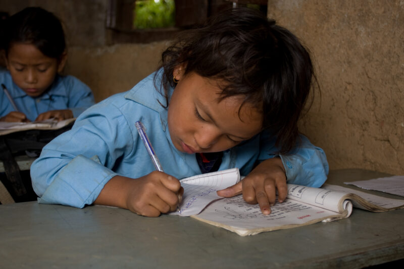 Student in Nepal School — Children attend school in rural Nepal, thanks to a sponsorship program run by ADRA — Nepal, students, children, elementary, school