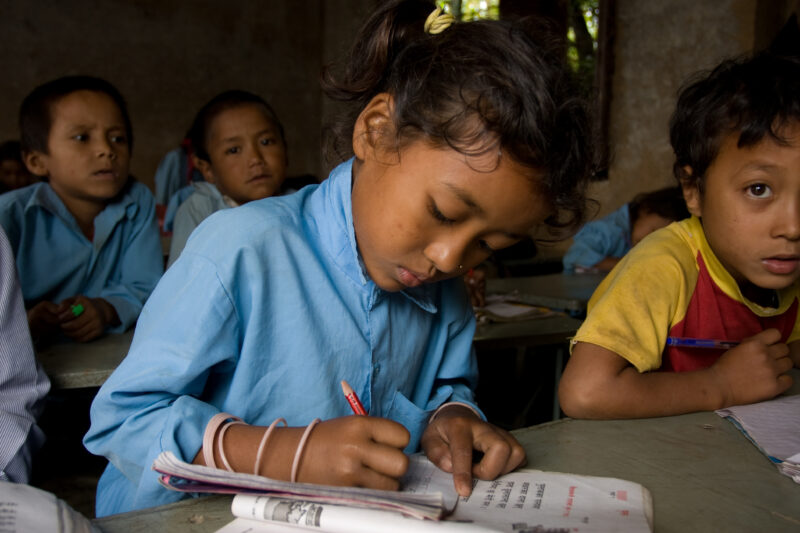 Student in Nepal School — Children attend school in rural Nepal, thanks to a sponsorship program run by ADRA — Nepal, students, children, elementary, school