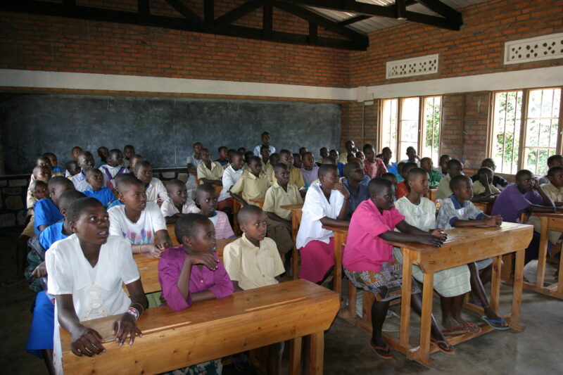 School in Rwanda — Students of refugees, returning to Rwanda after the genocide, attend schools built in a development program sponsored by ADRA and the Cana...