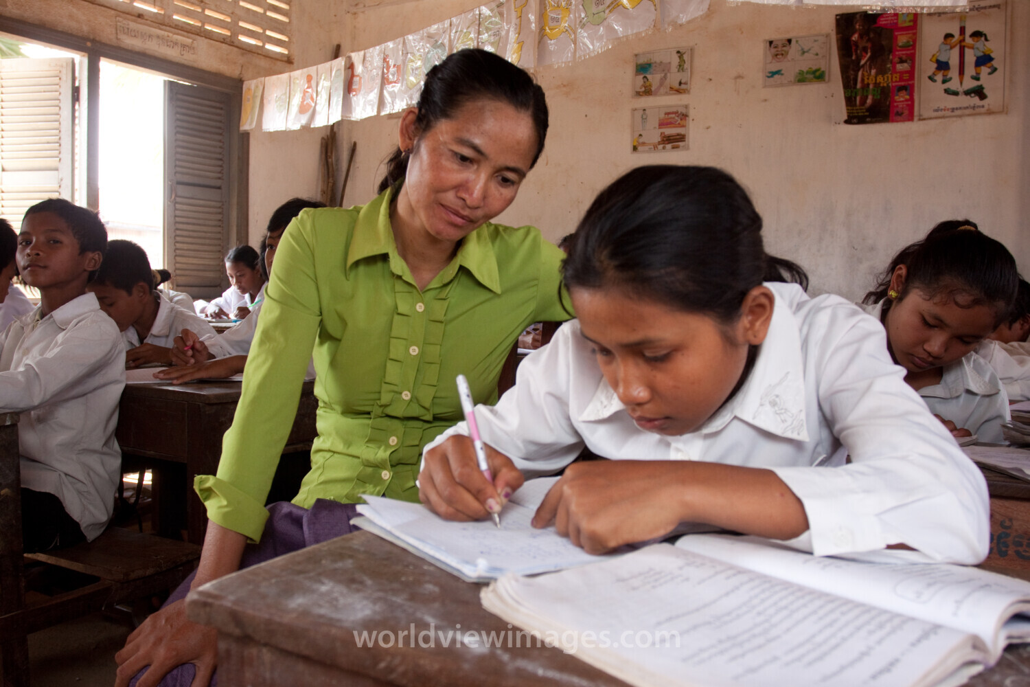 Teacher Helps Girl in Cambodia