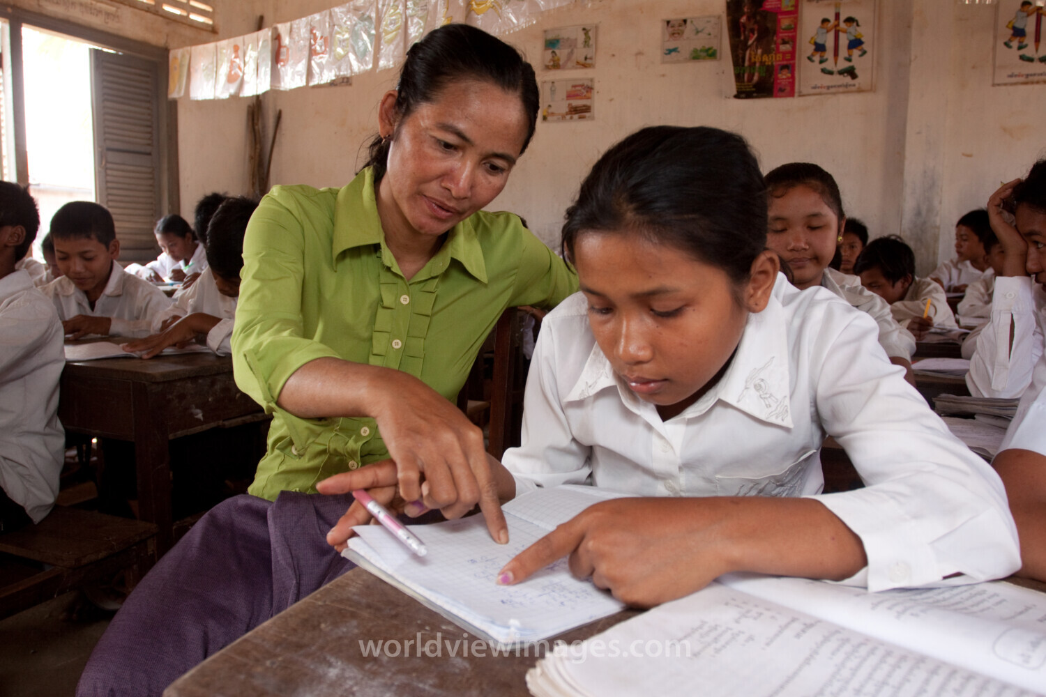Teacher Helps Girl in Cambodia