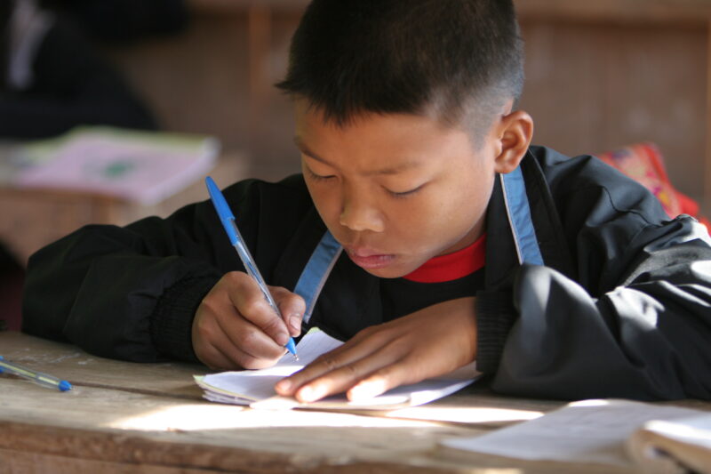 Student in a Rural School in Laos — Young children attend a school in their village, in a remote jungle region of northern Laos — Laos, Children, school, cla...
