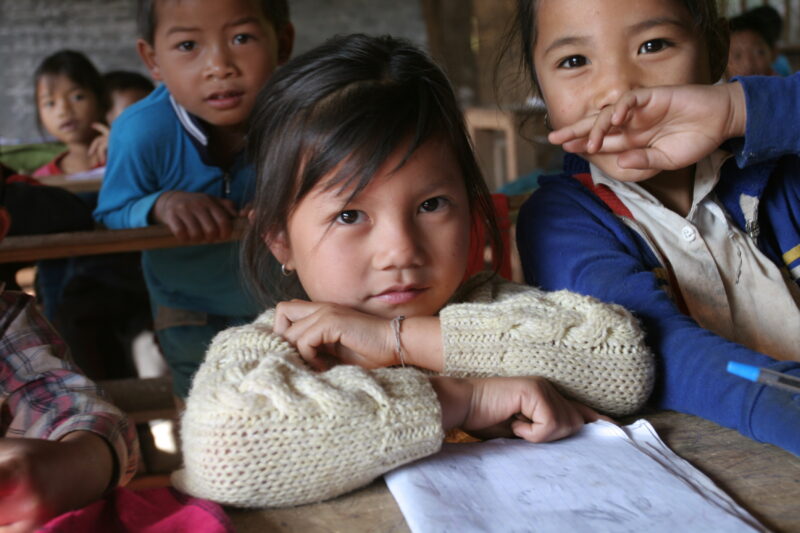 Student in a Rural School in Laos — Young children attend a school in their village, in a remote jungle region of northern Laos — Laos, Children, school, cla...