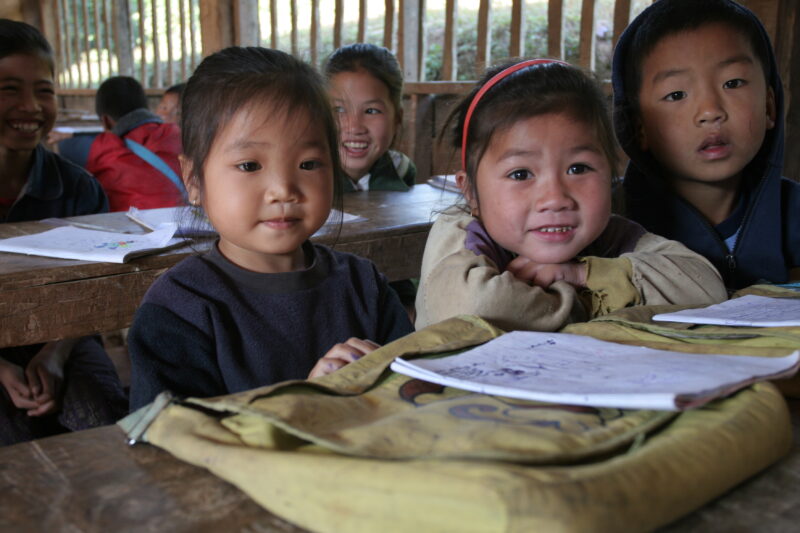 Student in a Rural School in Laos — Young children attend a school in their village, in a remote jungle region of northern Laos — Laos, Children, school, cla...