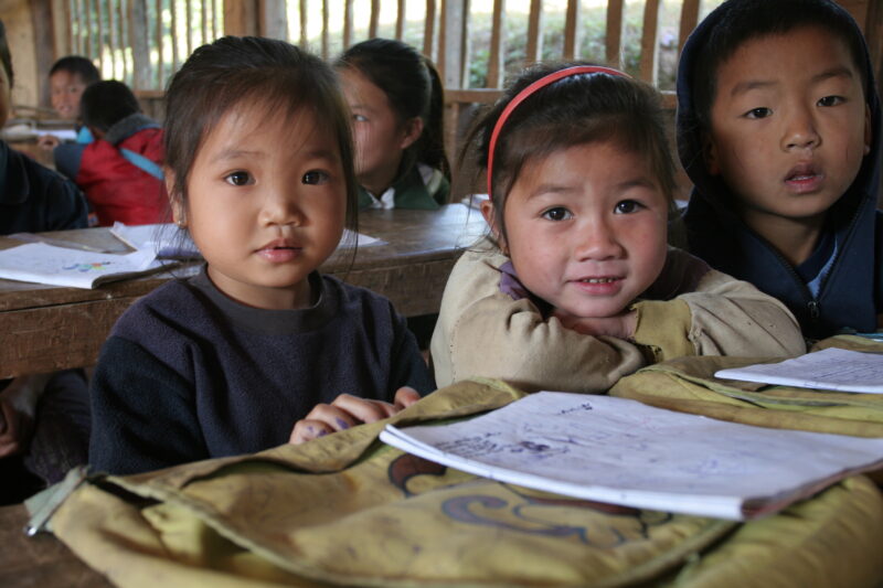 Student in a Rural School in Laos — Young children attend a school in their village, in a remote jungle region of northern Laos — Laos, Children, school, cla...