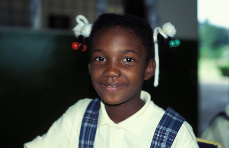 Girl in School in the Dominican Republic — International Childrens's Care in the Dominican Republic runs a christian school for the orphans they host. — Domi...