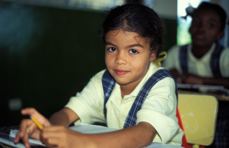 Girl in School in the Dominican Republic — International Childrens's Care in the Dominican Republic runs a christian school for the orphans they host. — Domi...