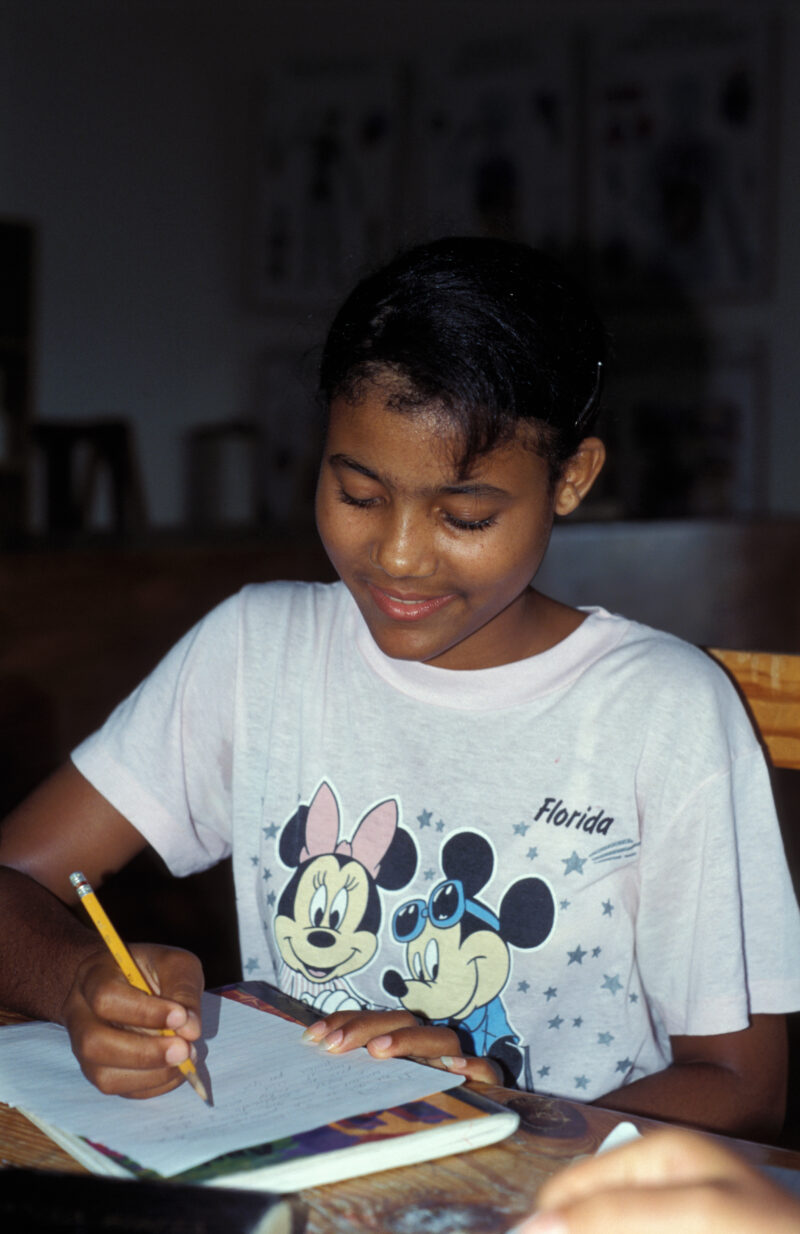 Girl in School in the Dominican Republic — International Childrens's Care in the Dominican Republic runs a christian school for the orphans they host. — Domi...