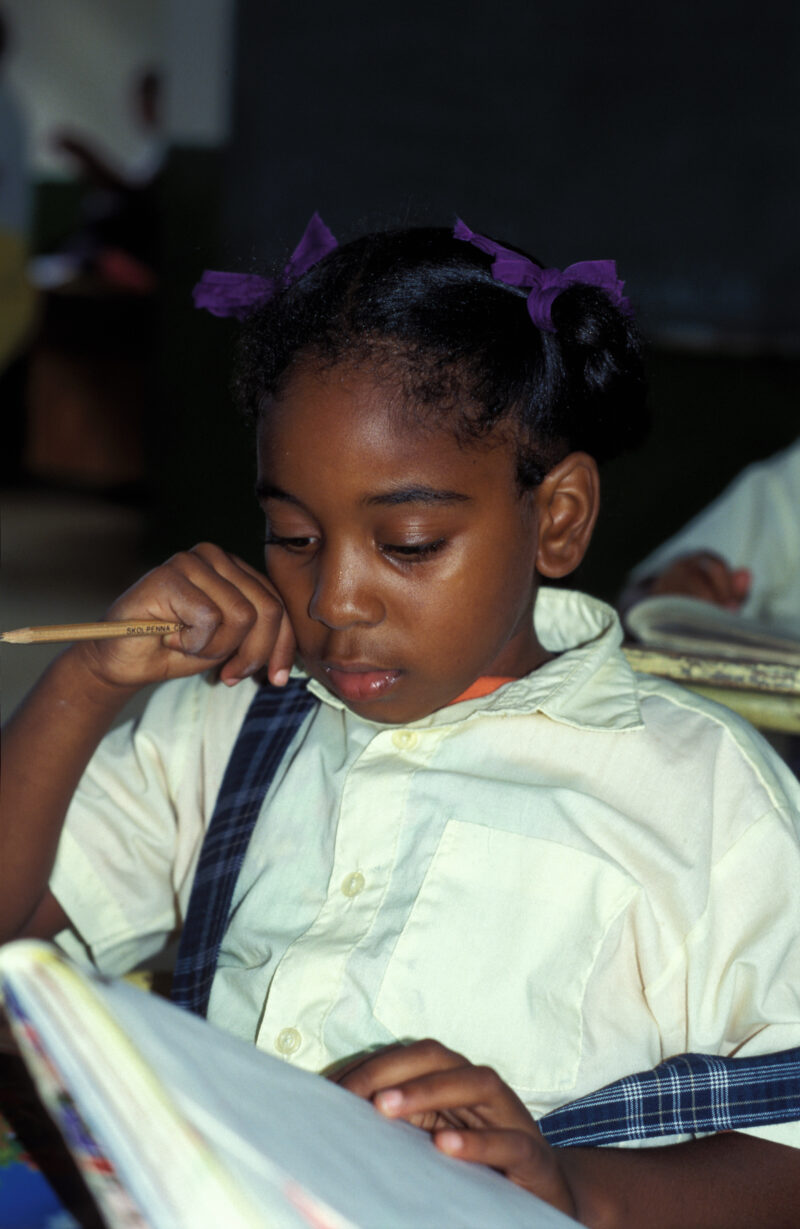 Girl in School in the Dominican Republic — International Childrens's Care in the Dominican Republic runs a christian school for the orphans they host. — Domi...