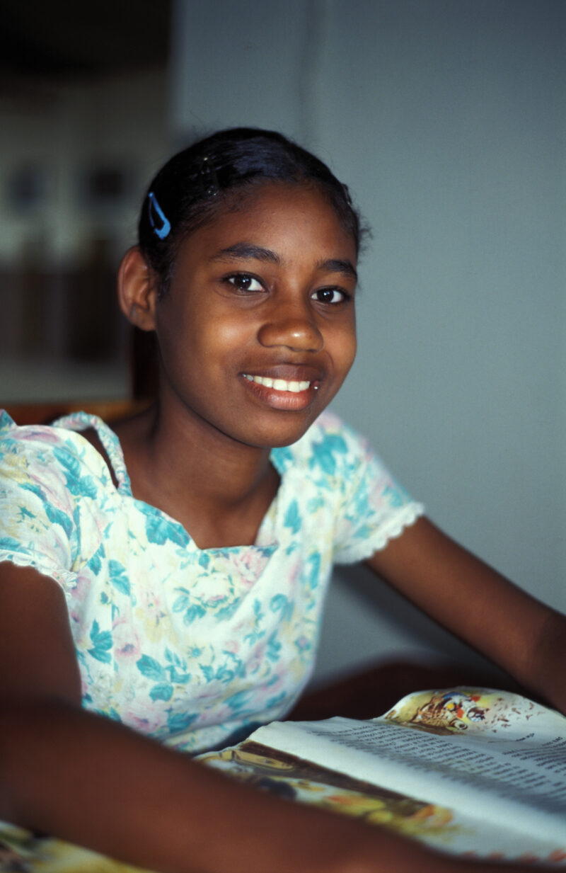 Girl in School in the Dominican Republic — International Childrens's Care in the Dominican Republic runs a christian school for the orphans they host. — Domi...