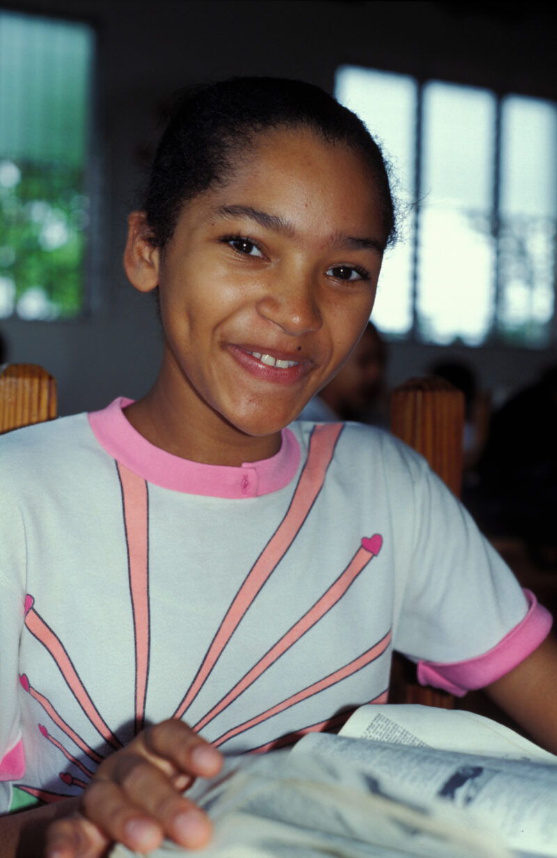 Girl in School in the Dominican Republic — International Childrens's Care in the Dominican Republic runs a christian school for the orphans they host. — Domi...